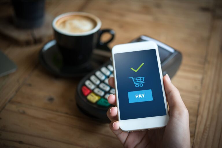 Paying For Coffee With Mobile Contactless Payment App Phone