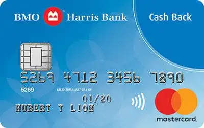 A blue BMO Harris Bank Mastercard credit card with Cash Back label, embossed numbers, chip, contactless symbol, and the Mastercard logo. Cardholder name reads HUBERT T LION.
