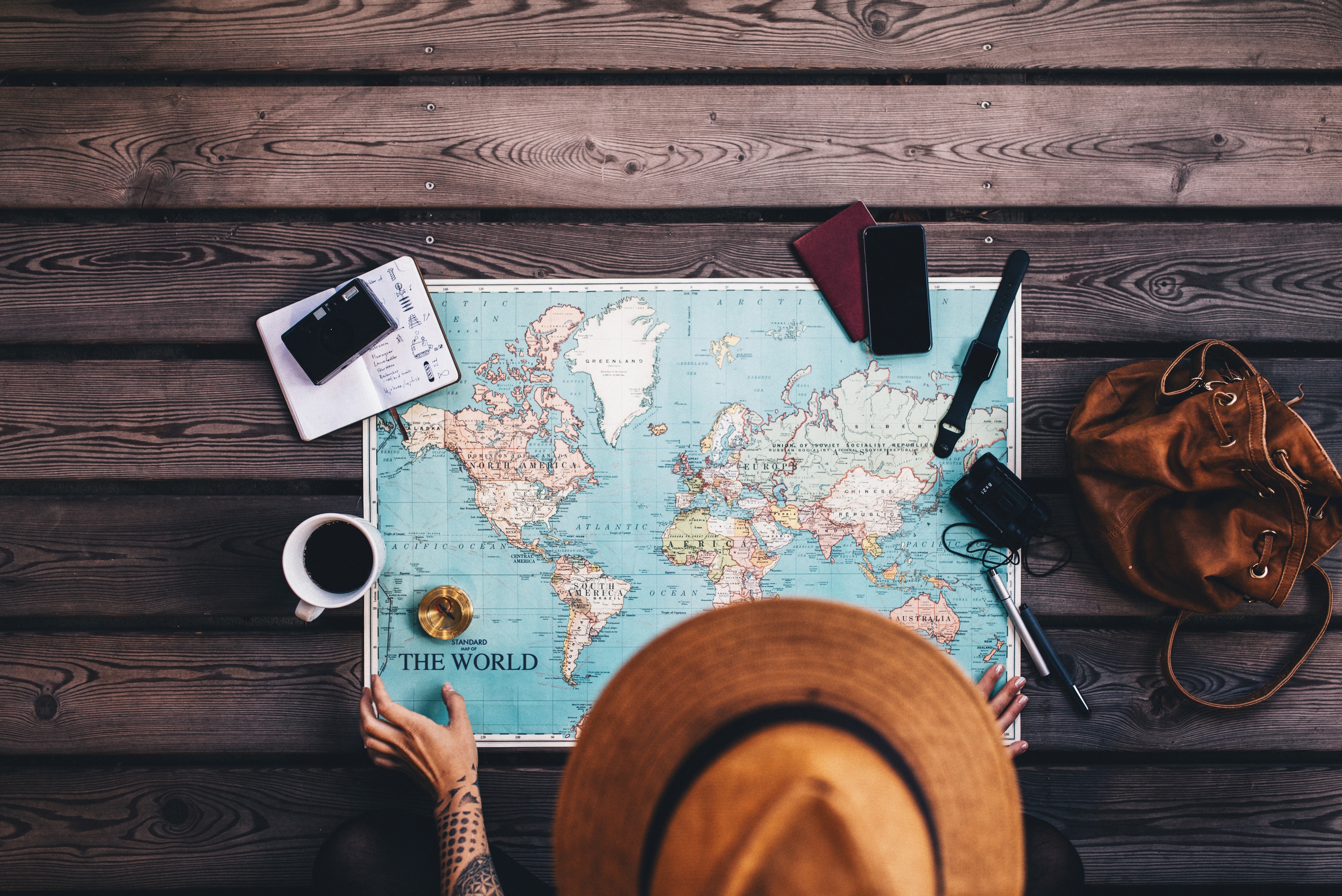 14 Ways to Travel the World for Free (or Even Get Paid)