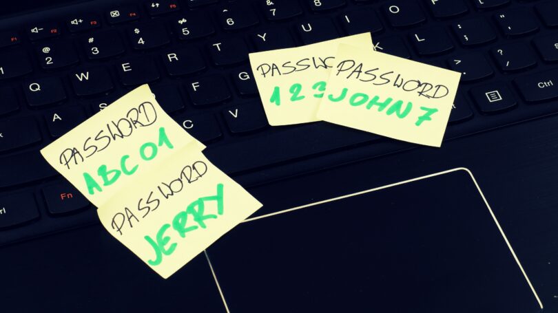 Weak Passwords On Post Its Laptop Keyboard