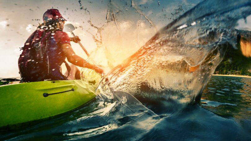 Lady Kayaking Splashing Waves Ocean