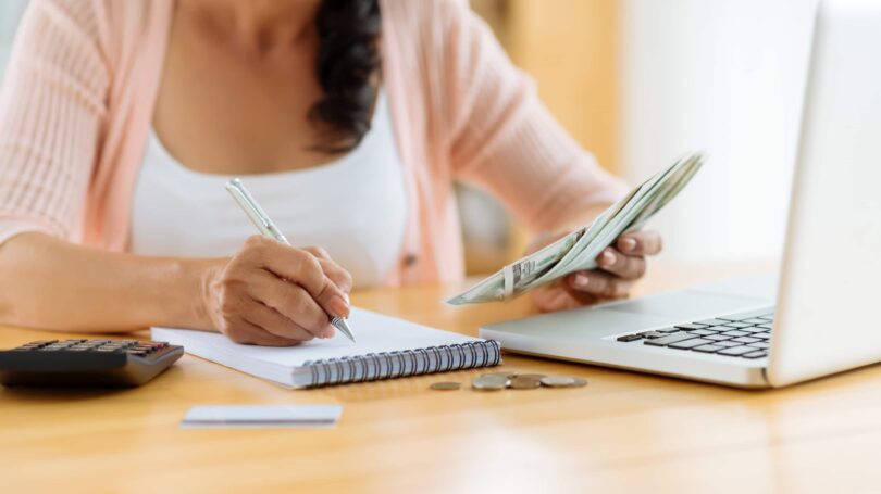 Woman Tracking Money Budgeting Counting Cash