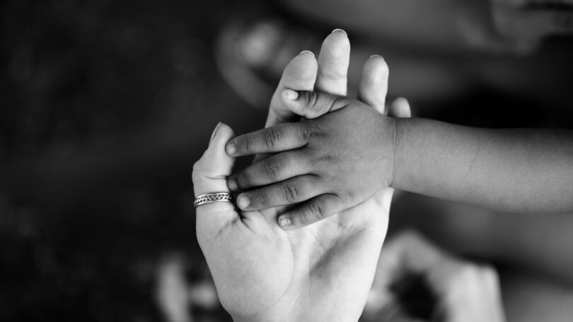 Adopting Baby White Black Hands Holding