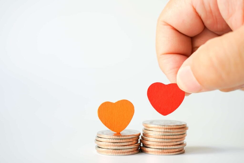 Concept Of Hearts Stacked On Coins Love Money