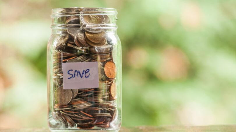 Coins In Jar Saving Change