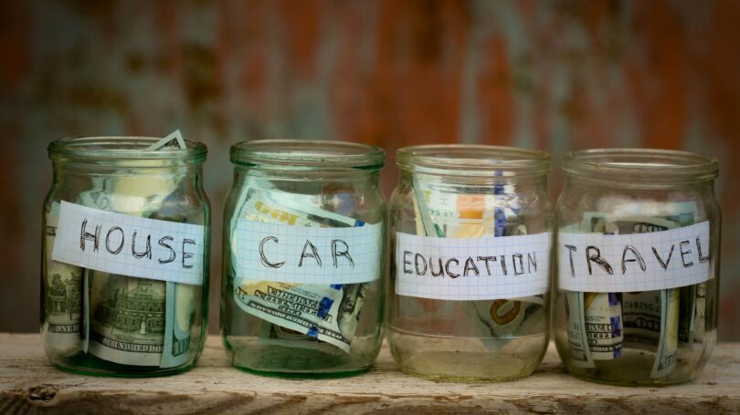 Jars Of Money Savings Funds For House Car Education Travel