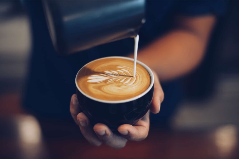 Barista Making Latte Art Coffee Shop