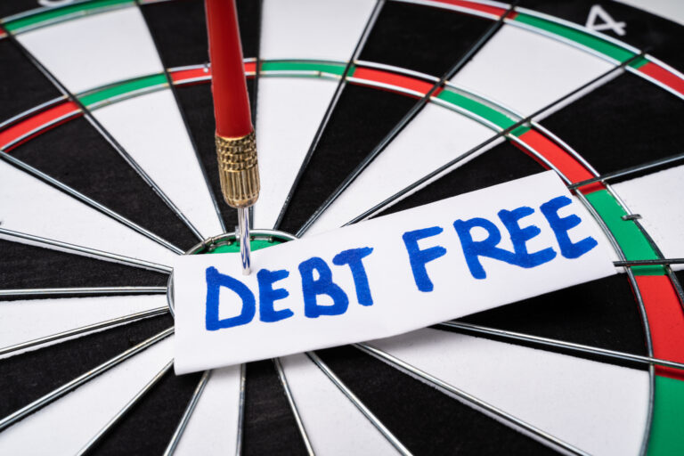 Debt Free Text At The Center Of Dartboard