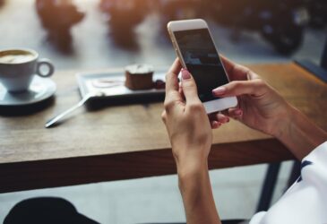 Woman Holding Smartphone Table Coffee