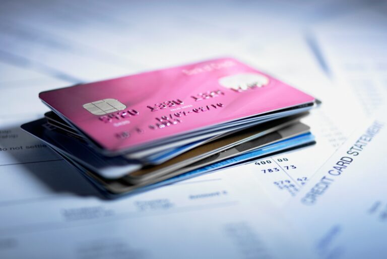 Stack Of Credit Cards On Bills