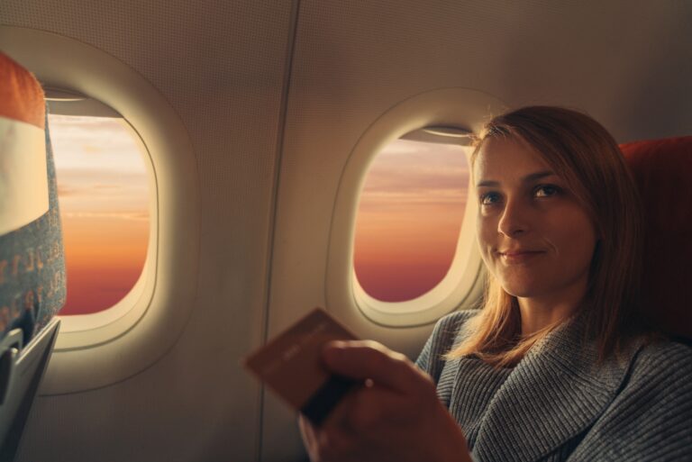 Woman Airplane Seat Credit Card
