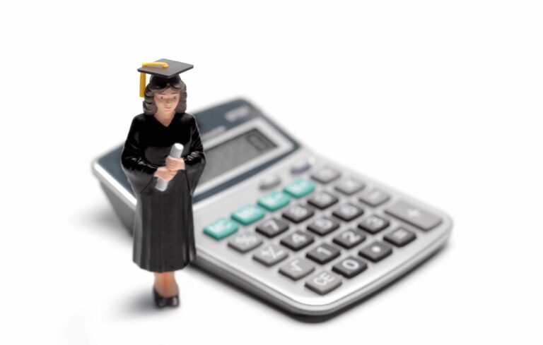 College Graduate Figurine And Calculator Scaled