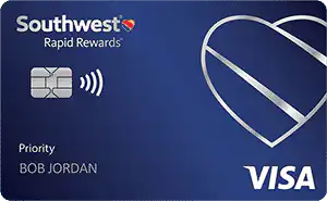 A Southwest Rapid Rewards Priority Visa credit card with a blue background, chip, contactless symbol, heart logo, and the name BOB JORDAN printed on it.