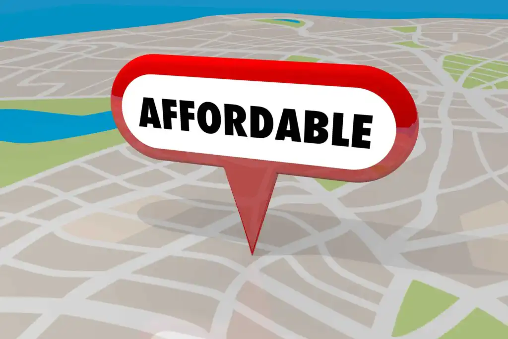 A red map pin with the word AFFORDABLE in bold letters is placed on a digital map background with roads and a river visible.