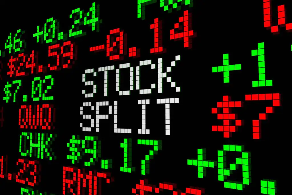 Digital stock ticker display with red and green numbers, showing price changes. The words “STOCK SPLIT” appear in large white block letters in the center.
