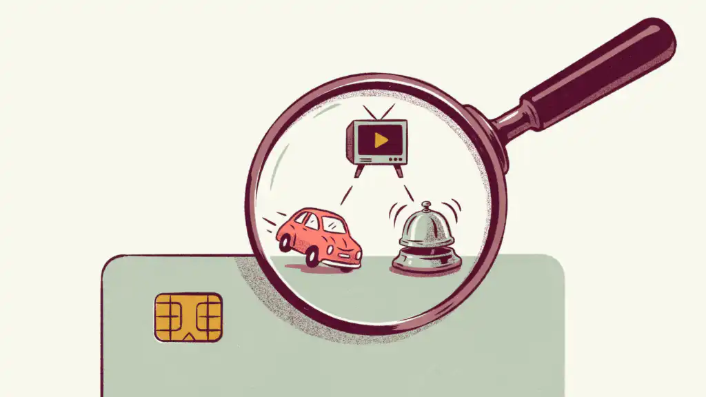 A magnifying glass over a sage credit card reveals hidden card perks, a coral car, a hotel bell and a TV with a play button