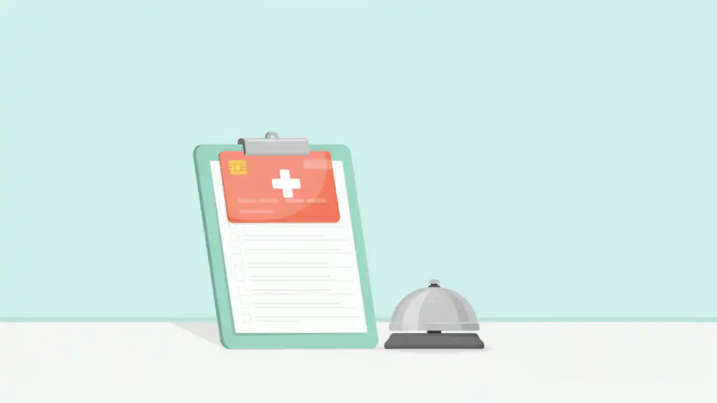 A coral medical credit card clipped over a checklist form on a clipboard beside a service bell