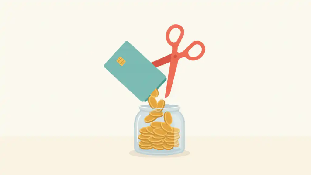 Teal credit card pouring gold coins into a glass jar while open coral scissors wait behind it