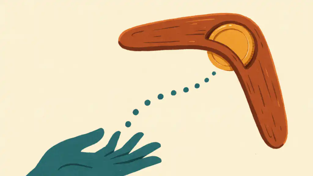 A wooden boomerang with a gold coin set in its bend arcs back toward an open teal hand.