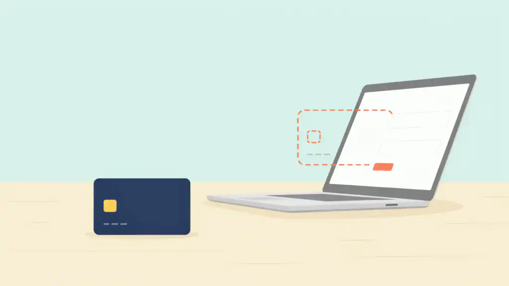 A dashed outline of a credit card slipping into a laptop checkout while the real navy card stays on the desk